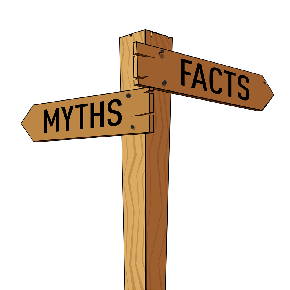 Photo of a signpost with two pointers, Myths and facts.