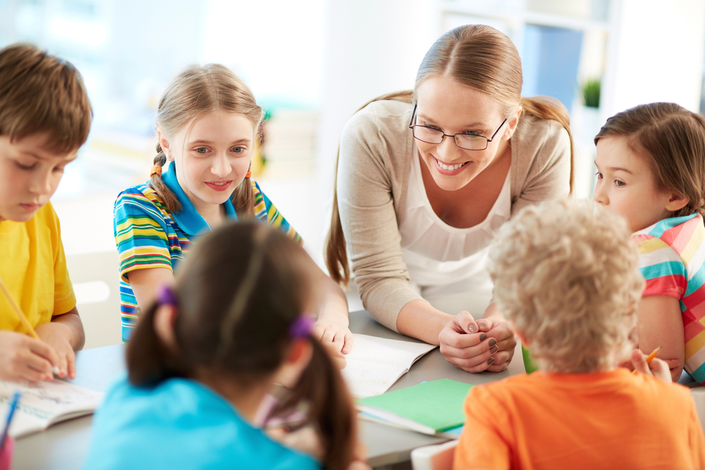 Teacher talking to kids