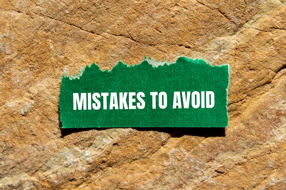 A sign saying Mistakes to Avoid