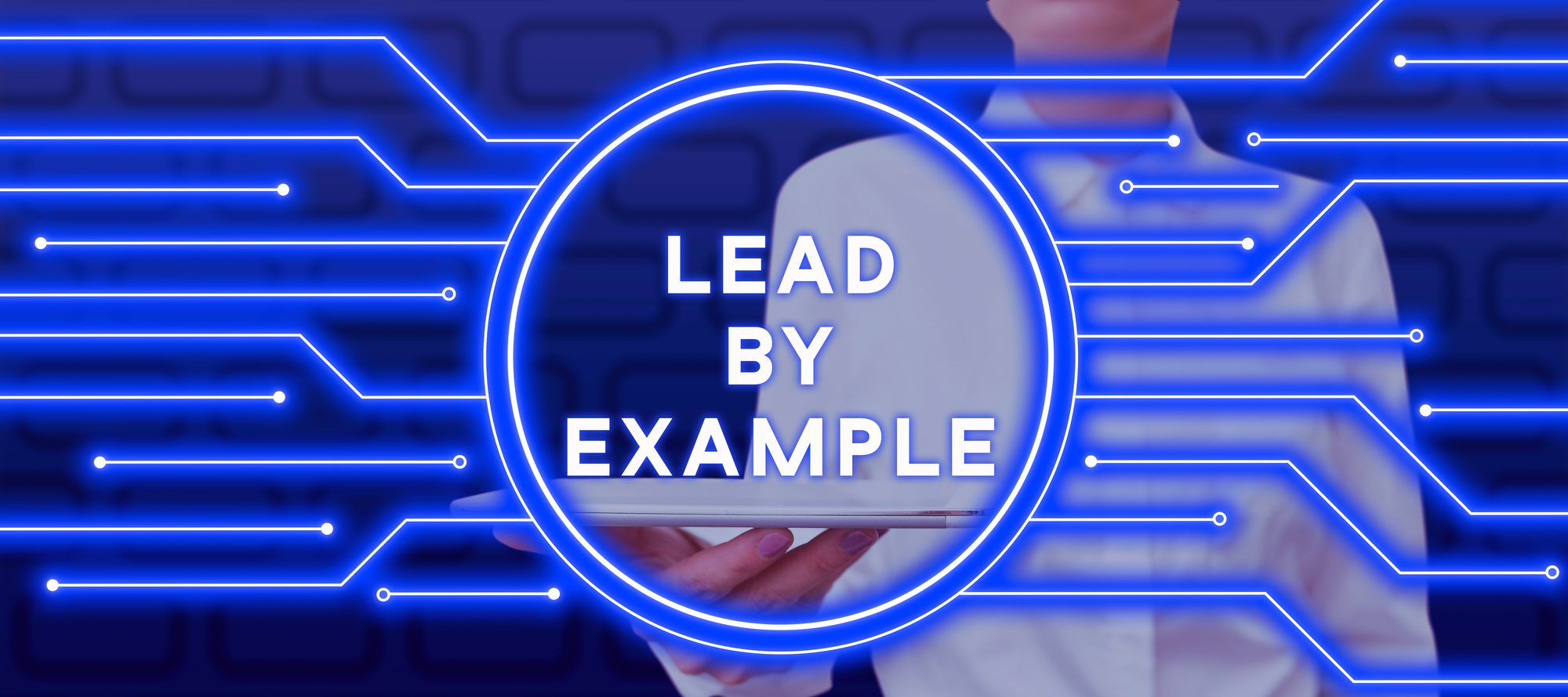 The words, Lead by example, in are in the centre of a computer chip.