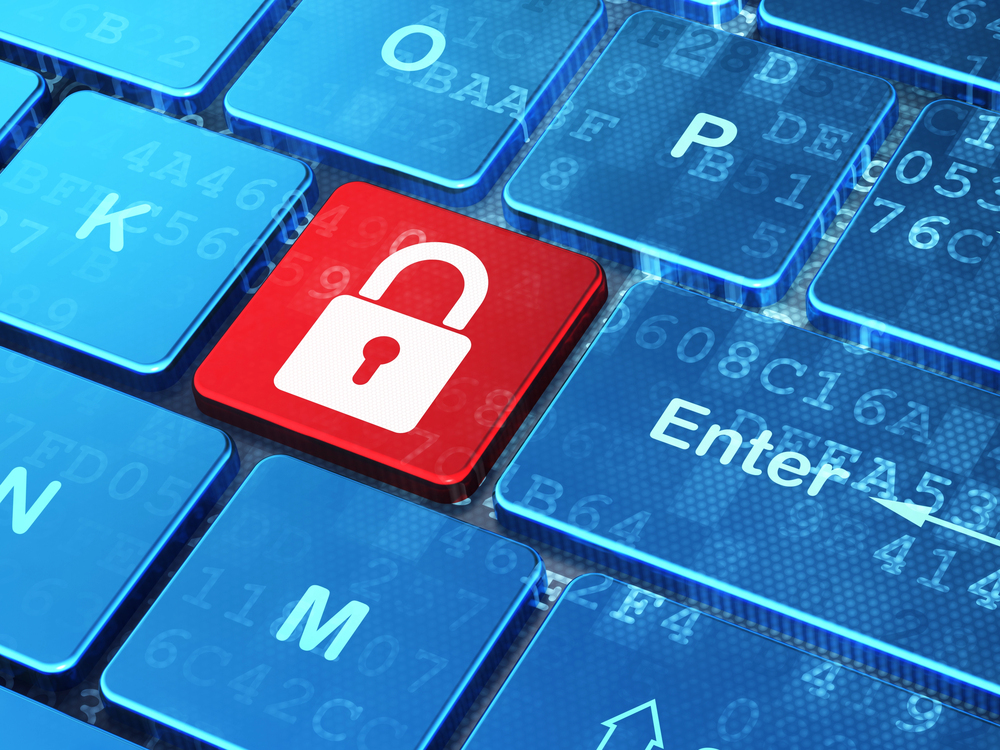 A keyboard is showing a lock on a key. Online Safety is the purpose of the photo