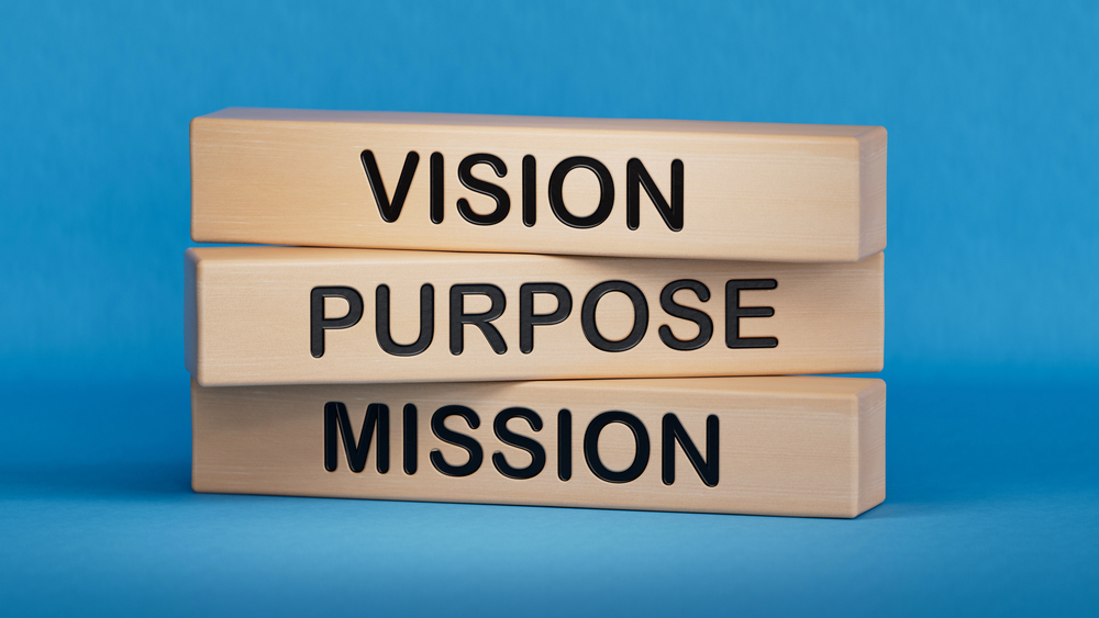 The words, Vision, Purpose and Mission are on three individual bars. The bars are sitting on top of each other.