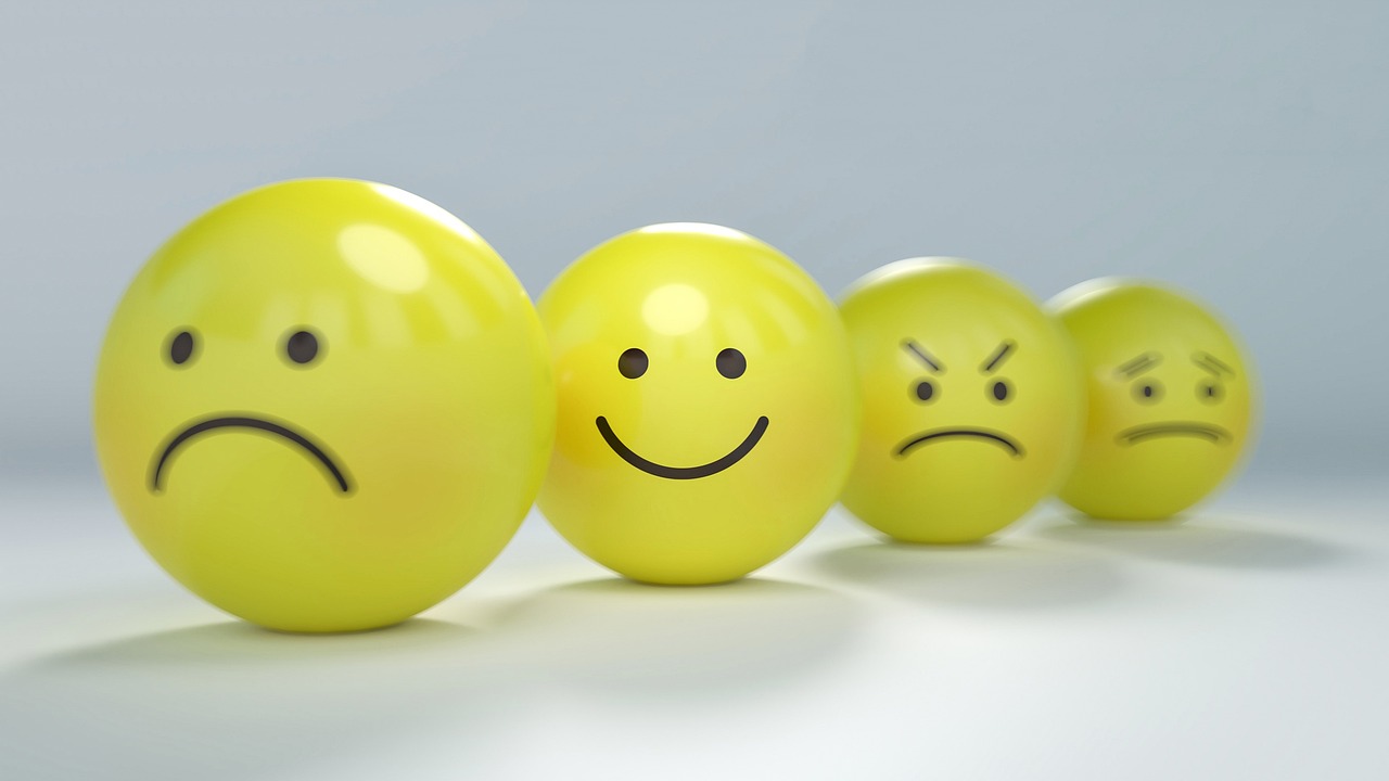 Four Smiley emoticons. Sad, happy, frustrated and angry emoticons.