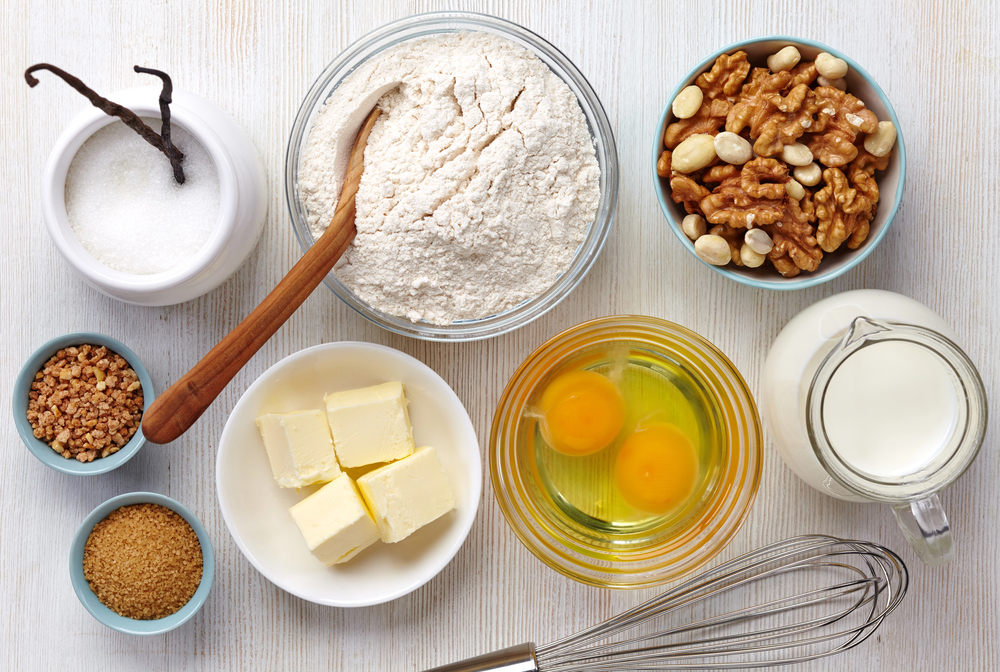 Cooking with vision impairment. Ingredients to make a cake on a table.