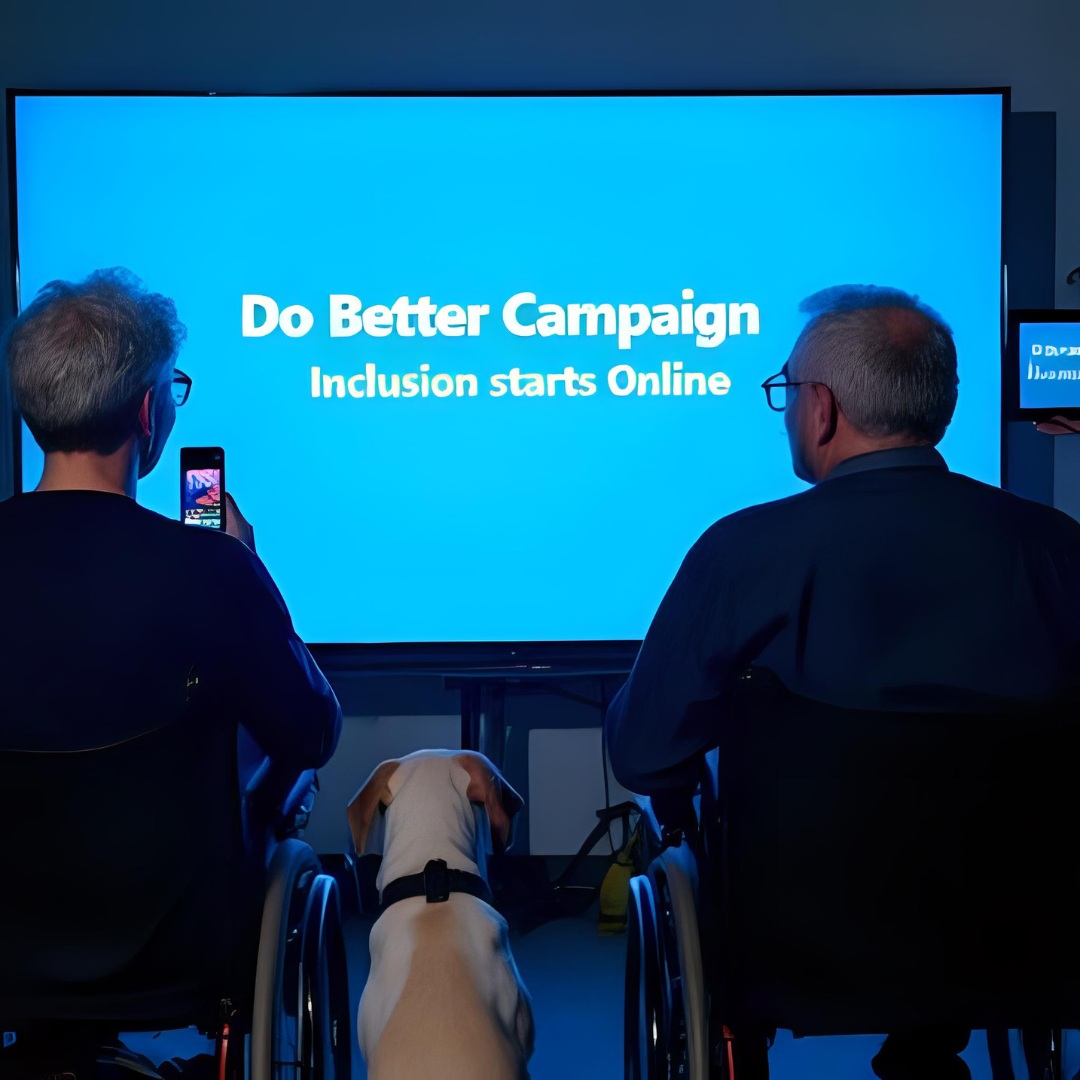 Two people in wheelchairs and a dog are looking at a tv with the words, Do Better Campaign Inclusion Starts Online.