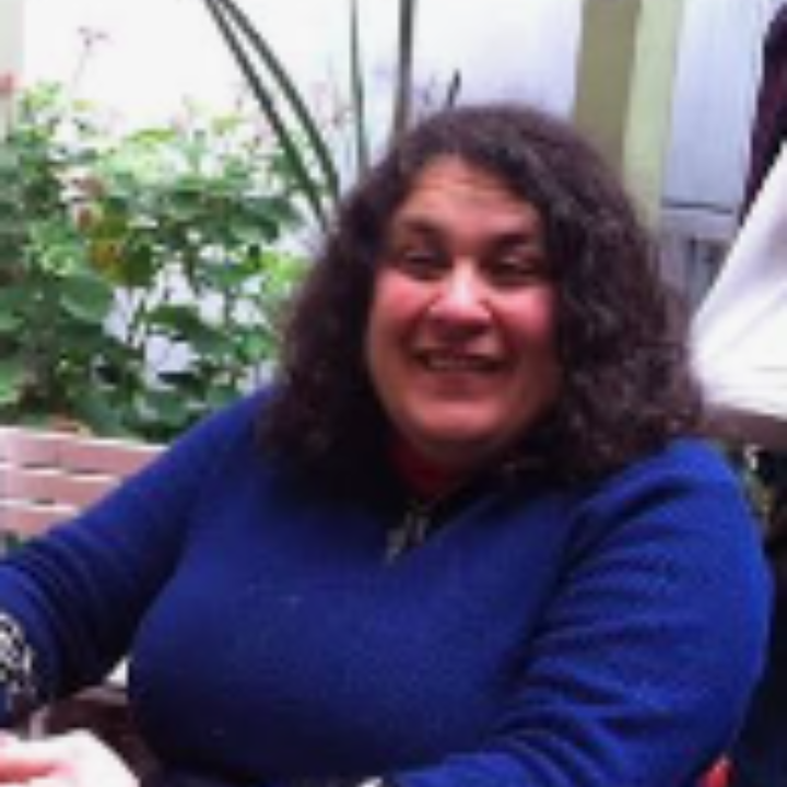 Marisa Sposaro is smiling at the camera.
